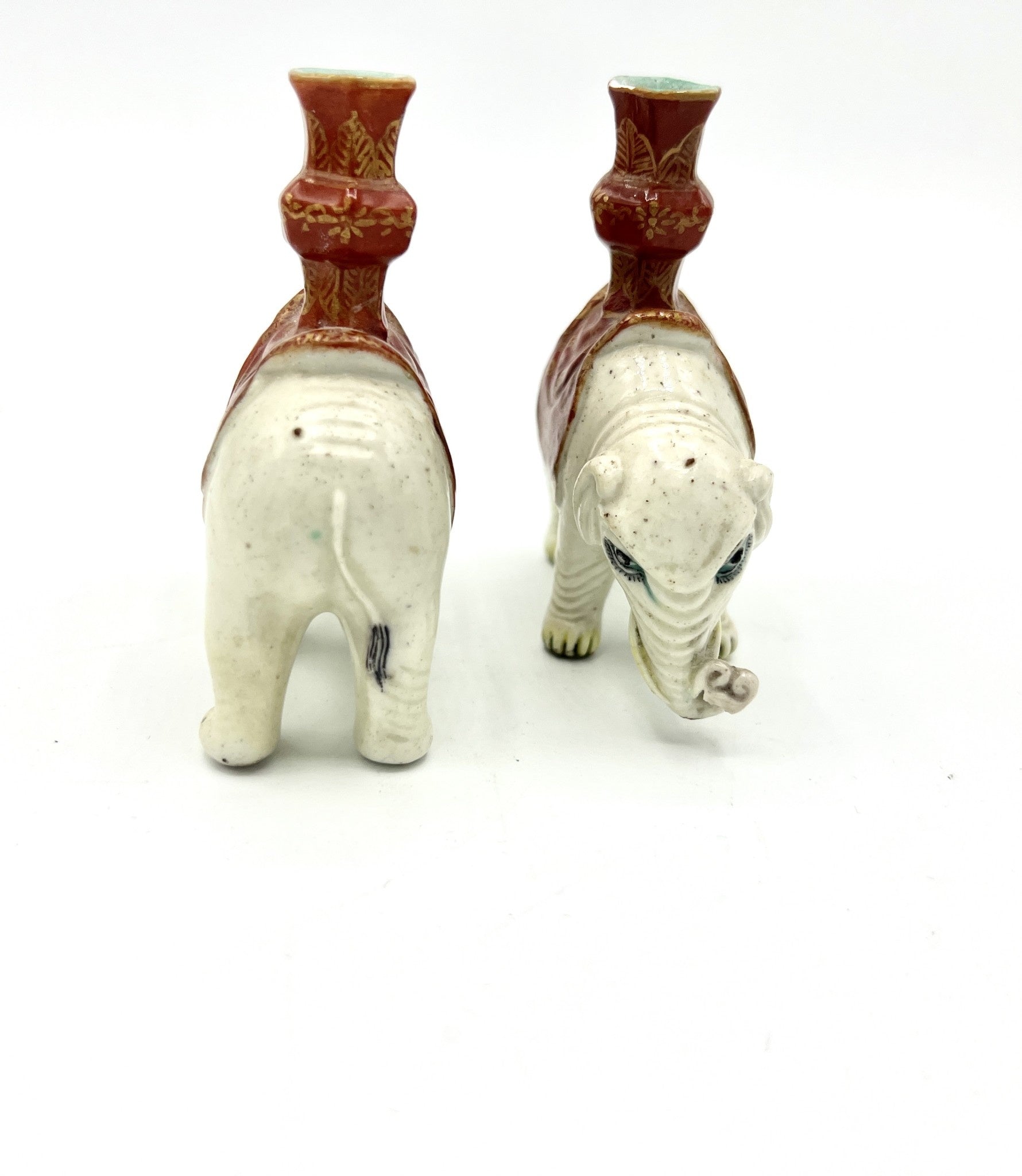 White elephants carrying red vases, view 2 | Cayen Home