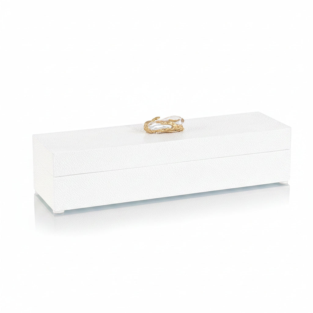 White jewelry box with a gold clasp on a white background
