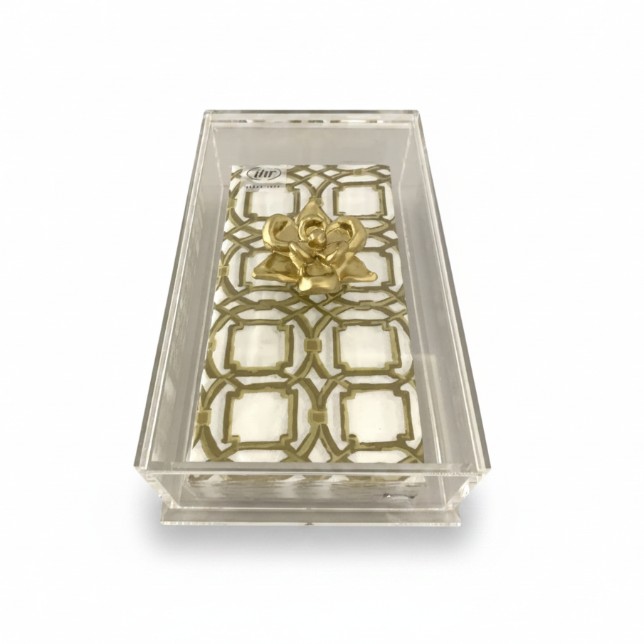 Decorative acrylic box with gold camelia on a white background