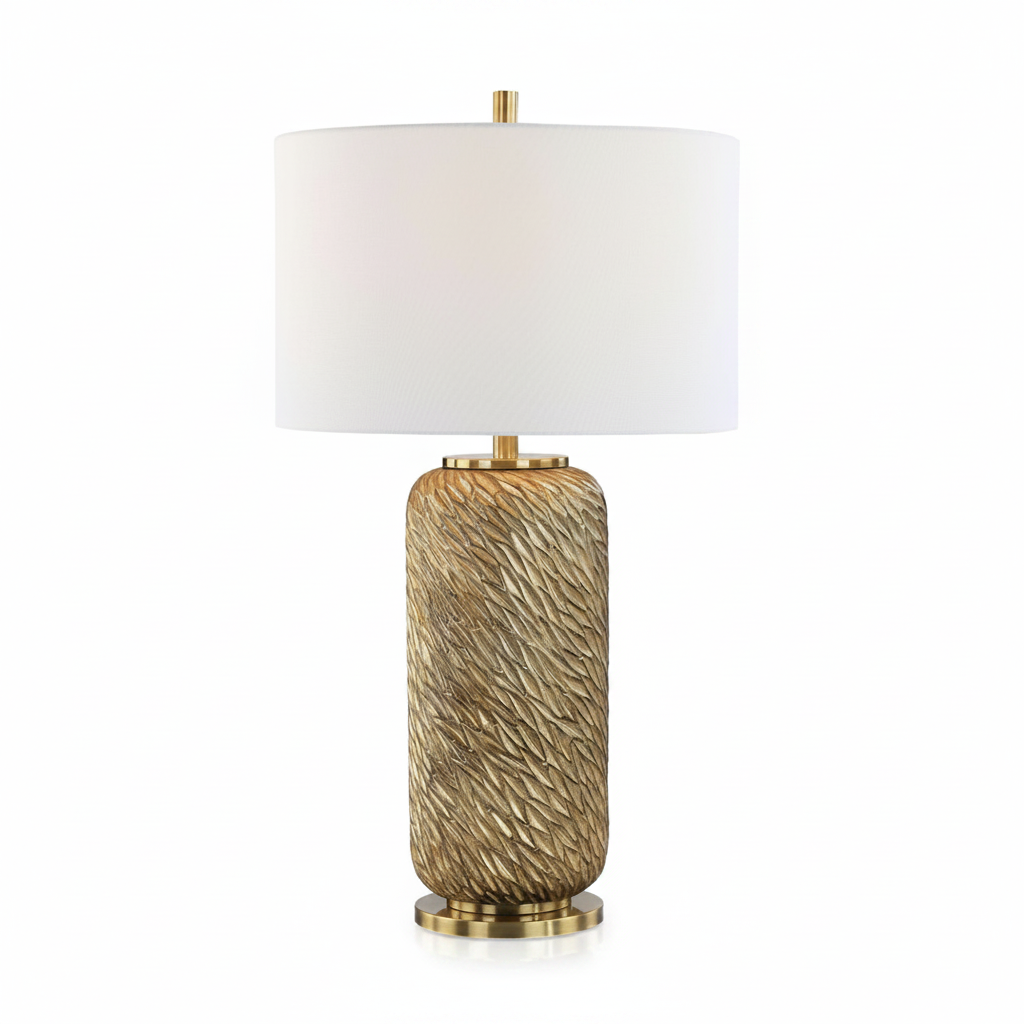 Decorative table lamp with textured base and white shade on a white background
