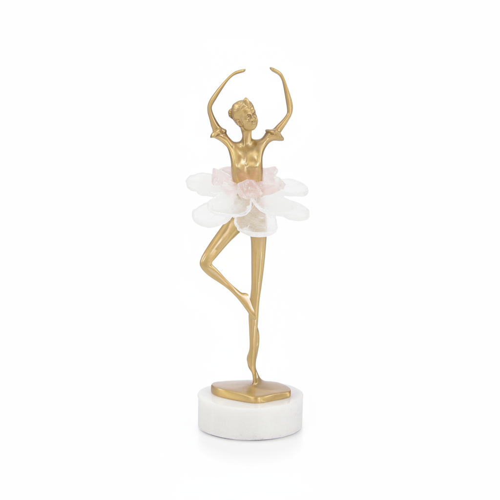Gold dancer figurine with a white base on a white background