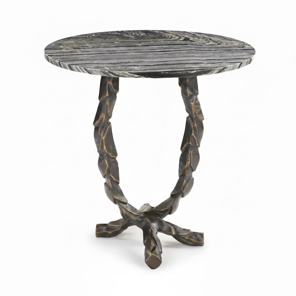 Round side table with textured surface and twisted metal legs on a white background