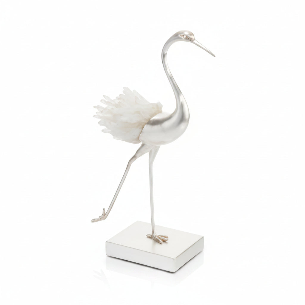 Decorative flamingo sculpture on a white background