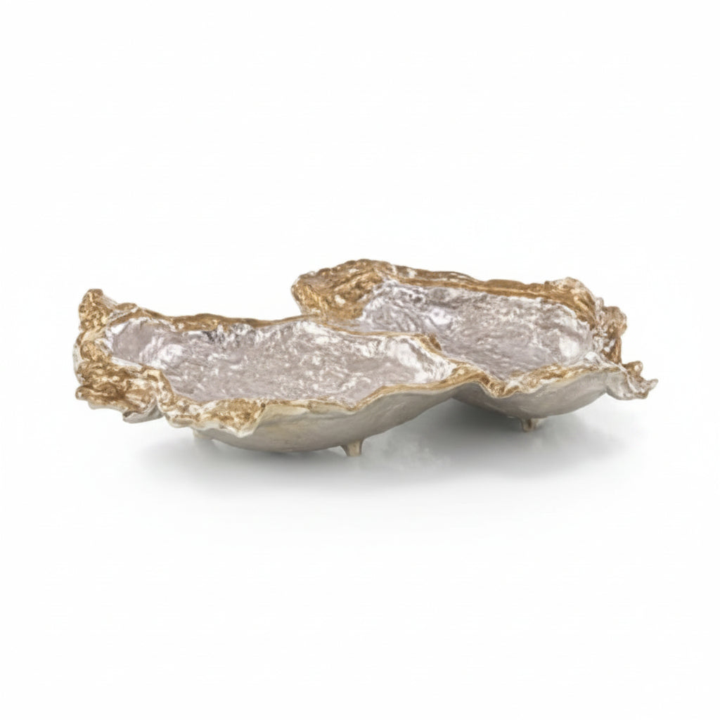 Decorative shell with gold rim on a white background