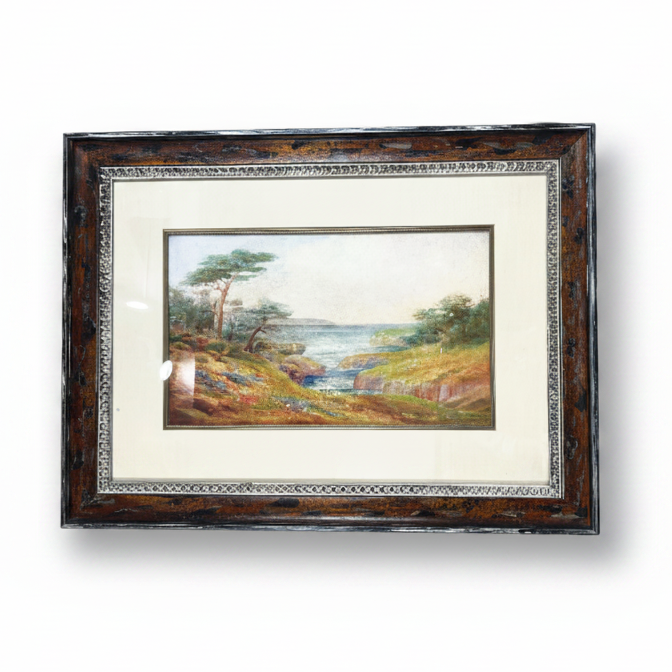 Framed landscape painting on a white background