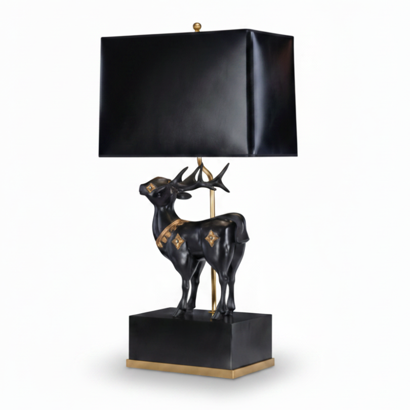 Tony Duquette Decorative table lamp with deer figure and black shade on a white background