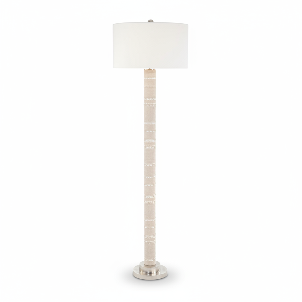 Floor lamp with a white shade on a white background