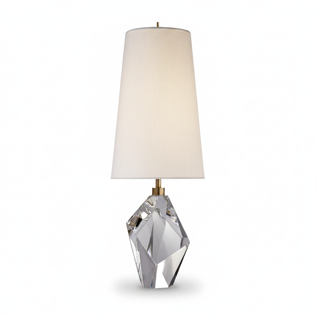 Table lamp with crystal base and white shade on a white background