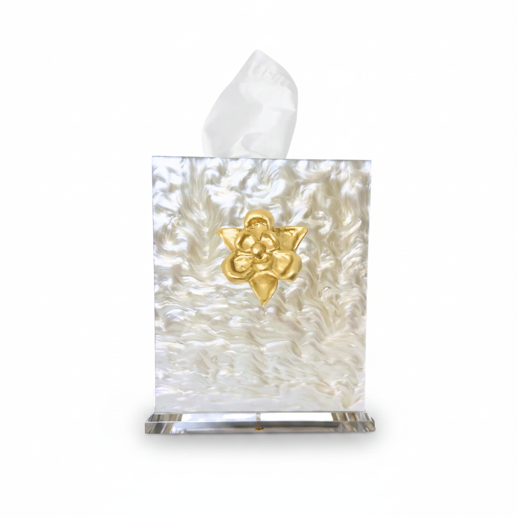 Tissue box cover with floral design and gold accent on a white background